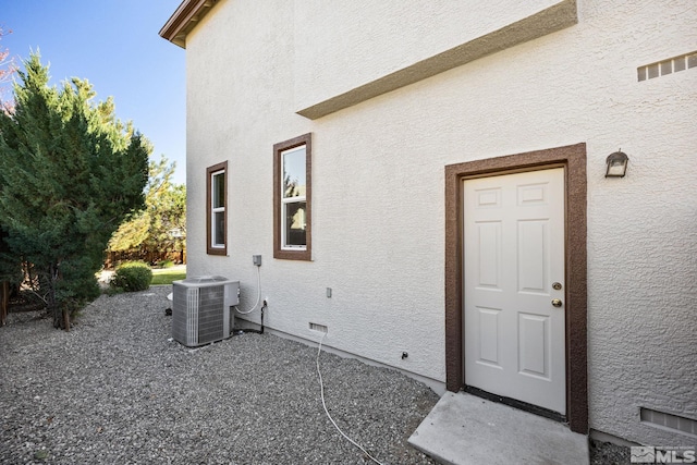 entrance to property with central air condition unit