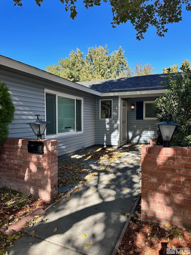 single story home featuring a patio area