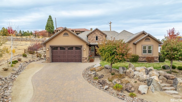 view of front of property with a garage