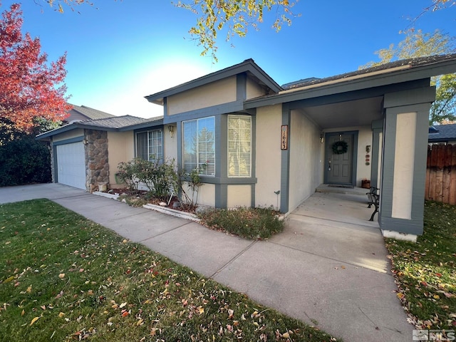 ranch-style home with a garage