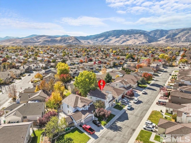 bird's eye view with a mountain view