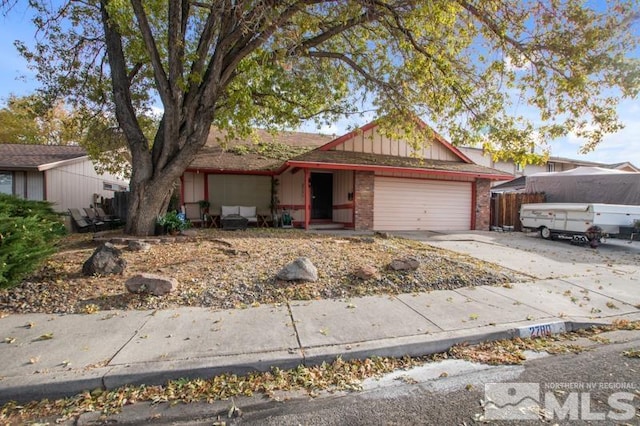 ranch-style house featuring a garage