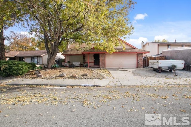 ranch-style home with a garage