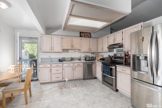 kitchen featuring appliances with stainless steel finishes and sink