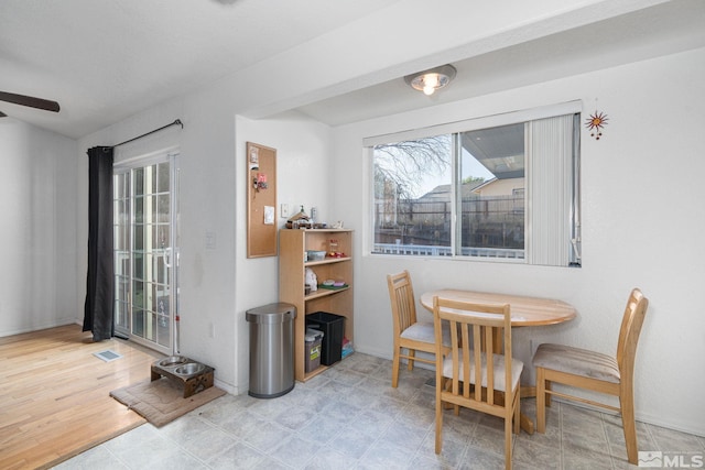 dining room featuring ceiling fan and light hardwood / wood-style flooring