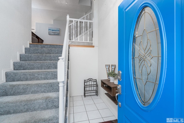 view of tiled foyer entrance