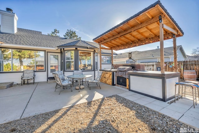 view of patio / terrace with an outdoor kitchen and grilling area