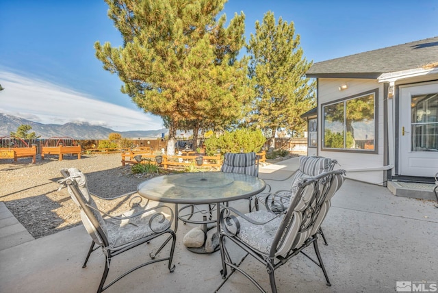 view of patio with a mountain view