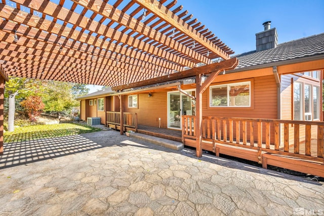 view of patio featuring central AC unit, a pergola, and a wooden deck