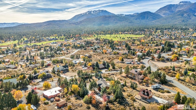 drone / aerial view featuring a mountain view