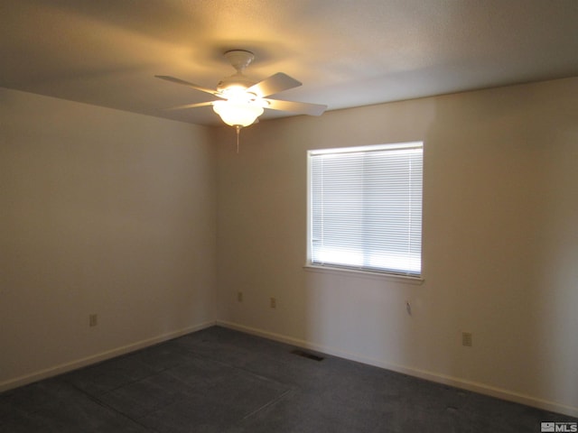 spare room featuring ceiling fan