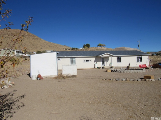 view of front of house with a mountain view