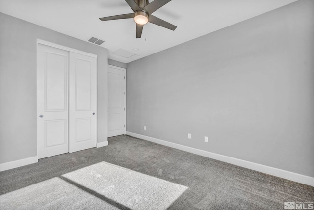 unfurnished bedroom featuring ceiling fan, a closet, and carpet floors