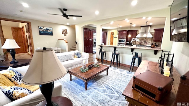 living room with ceiling fan