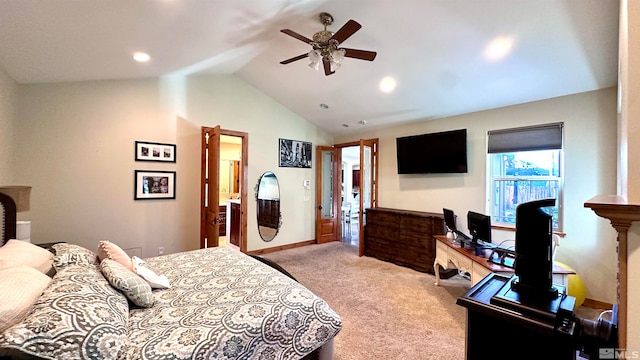 carpeted bedroom featuring ceiling fan and vaulted ceiling