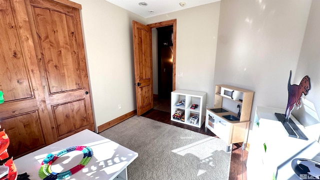 office area with dark wood-type flooring