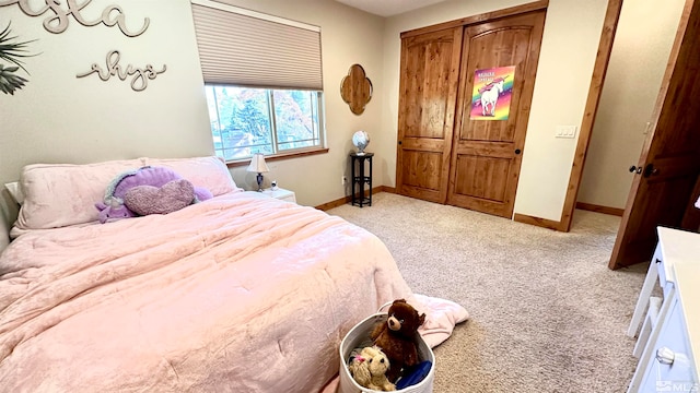 carpeted bedroom with a closet