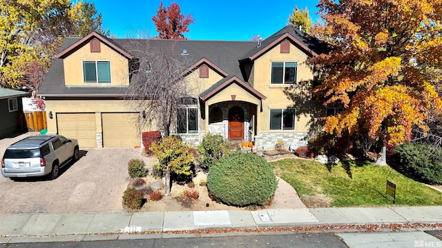 view of front of home with a garage