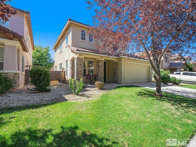 view of front of house with a garage and a front lawn