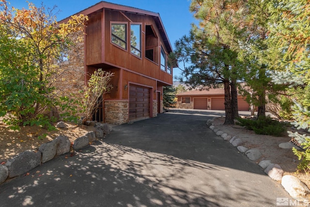 view of property exterior with a garage