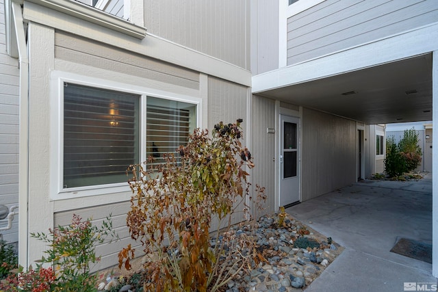 entrance to property with a patio area