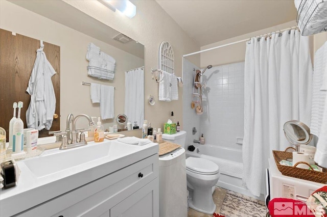 full bathroom with vanity, shower / tub combo with curtain, tile patterned flooring, and toilet