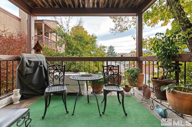 balcony featuring a grill