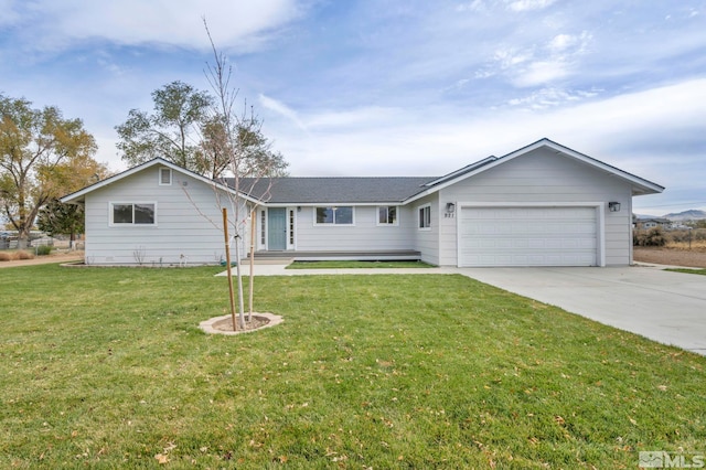 ranch-style home with a garage and a front lawn