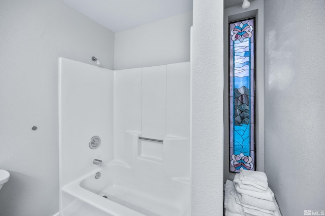 bathroom featuring bathing tub / shower combination