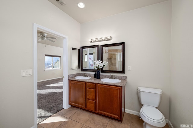 bathroom featuring vanity, ceiling fan, tile patterned flooring, and toilet