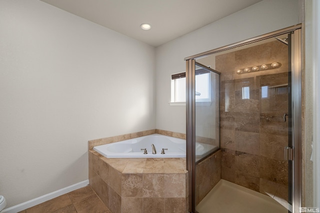 bathroom featuring independent shower and bath, tile patterned floors, and toilet