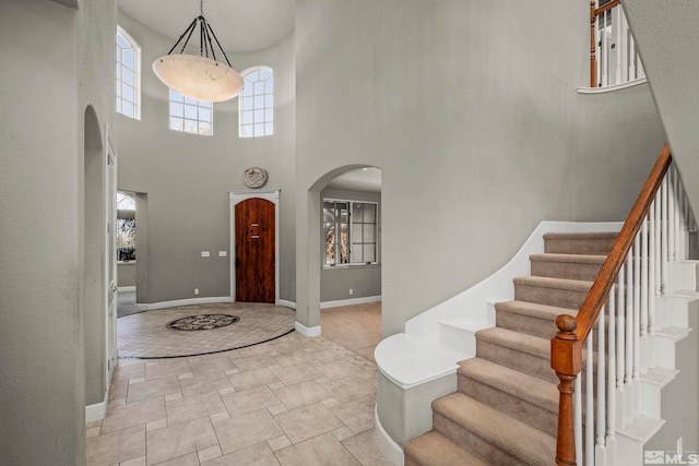 entryway with a high ceiling