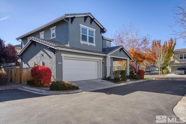 front of property featuring a garage