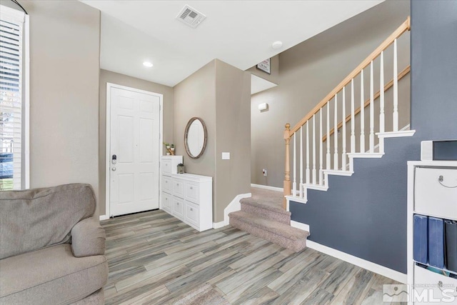 entryway featuring hardwood / wood-style flooring