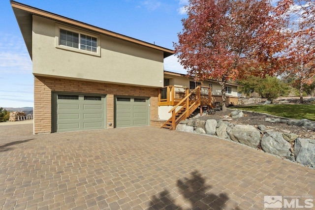 view of front of home featuring a garage