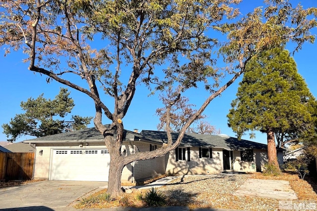 single story home with a garage