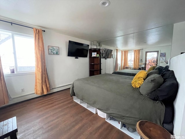 bedroom featuring dark hardwood / wood-style floors