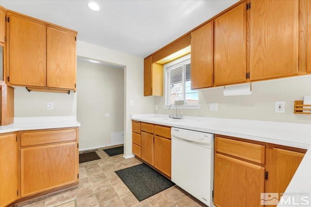 kitchen featuring sink and white dishwasher