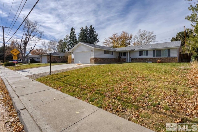 ranch-style home with a front yard and a garage