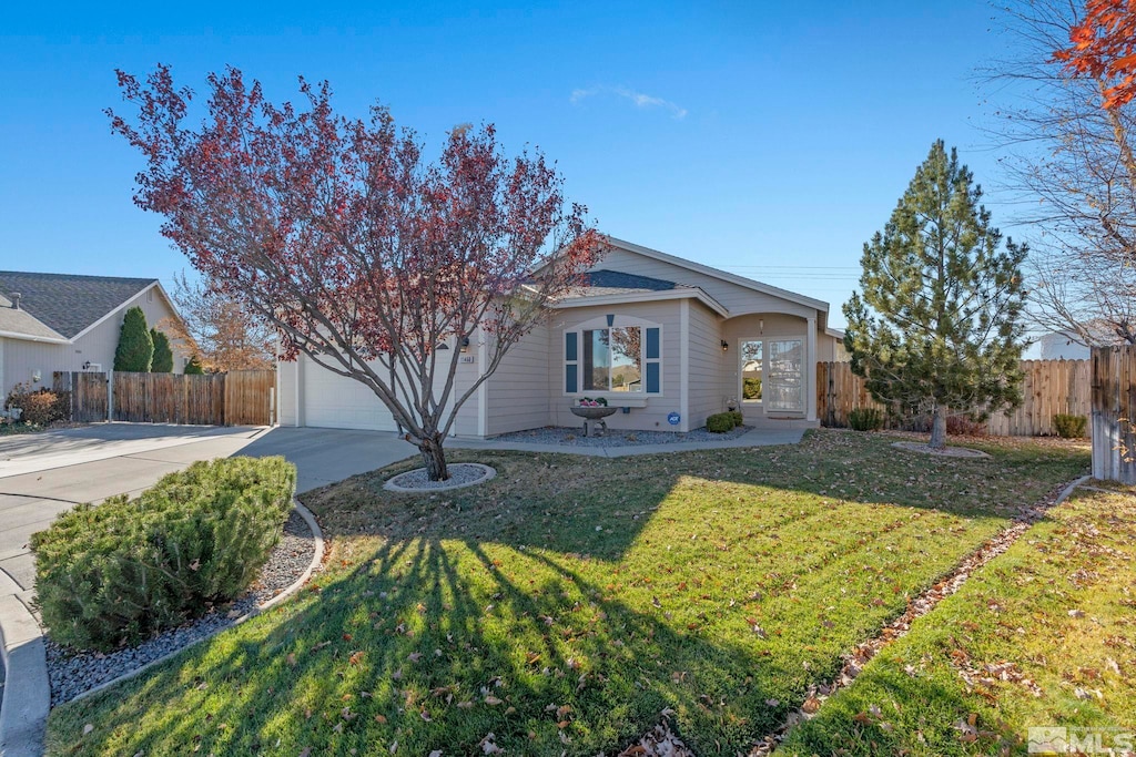 ranch-style house with a front lawn and a garage