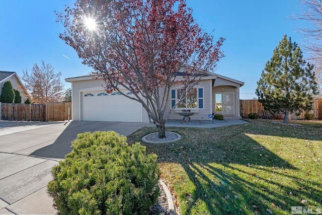 ranch-style home with a front lawn and a garage