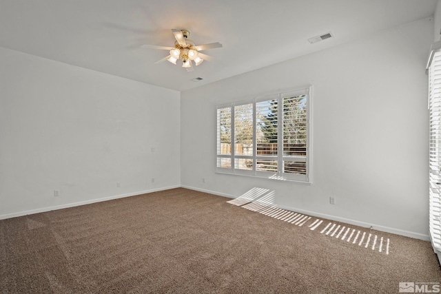 carpeted empty room with ceiling fan