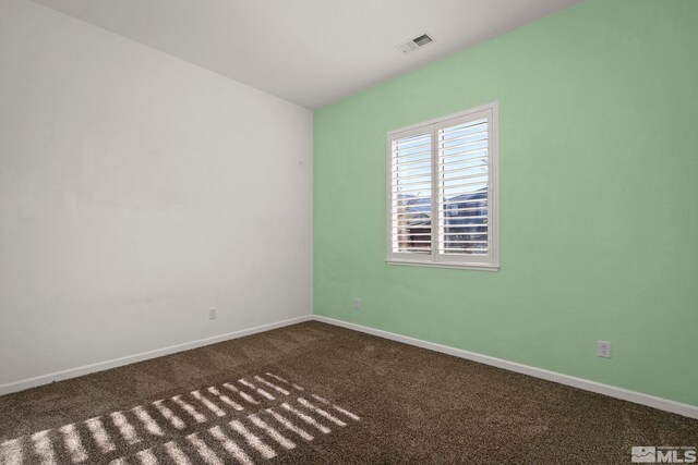 spare room with carpet flooring