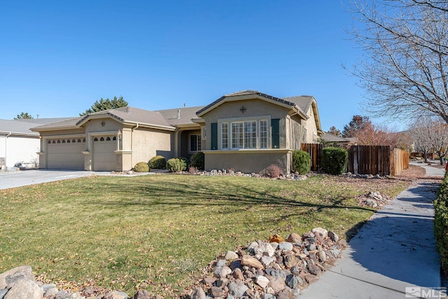 ranch-style home with a garage and a front yard