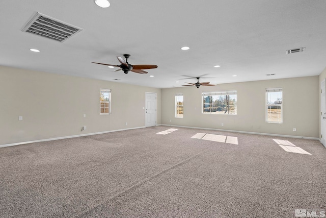 carpeted empty room with ceiling fan