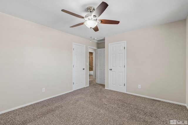 unfurnished bedroom featuring carpet floors and ceiling fan