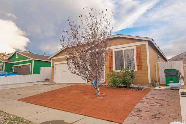 view of front of property featuring a garage