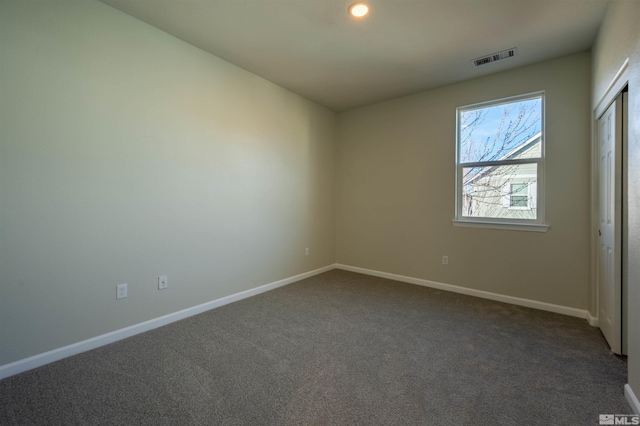 view of carpeted spare room