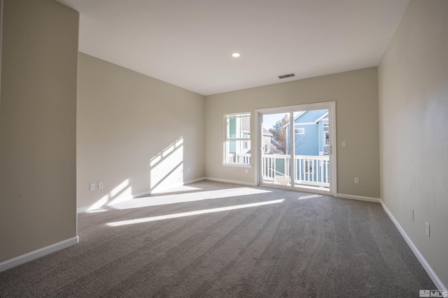 view of carpeted spare room