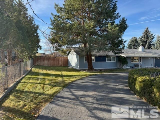 view of front of home with a front yard